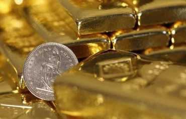 الذهب يتراجع مع توخي الحذر قبل قرار الفائدة الأمريكية